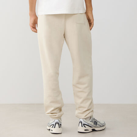 NEW BALANCE PANT JOGGER SMALL LOGO FT BEIGE/BIANCO UOMO